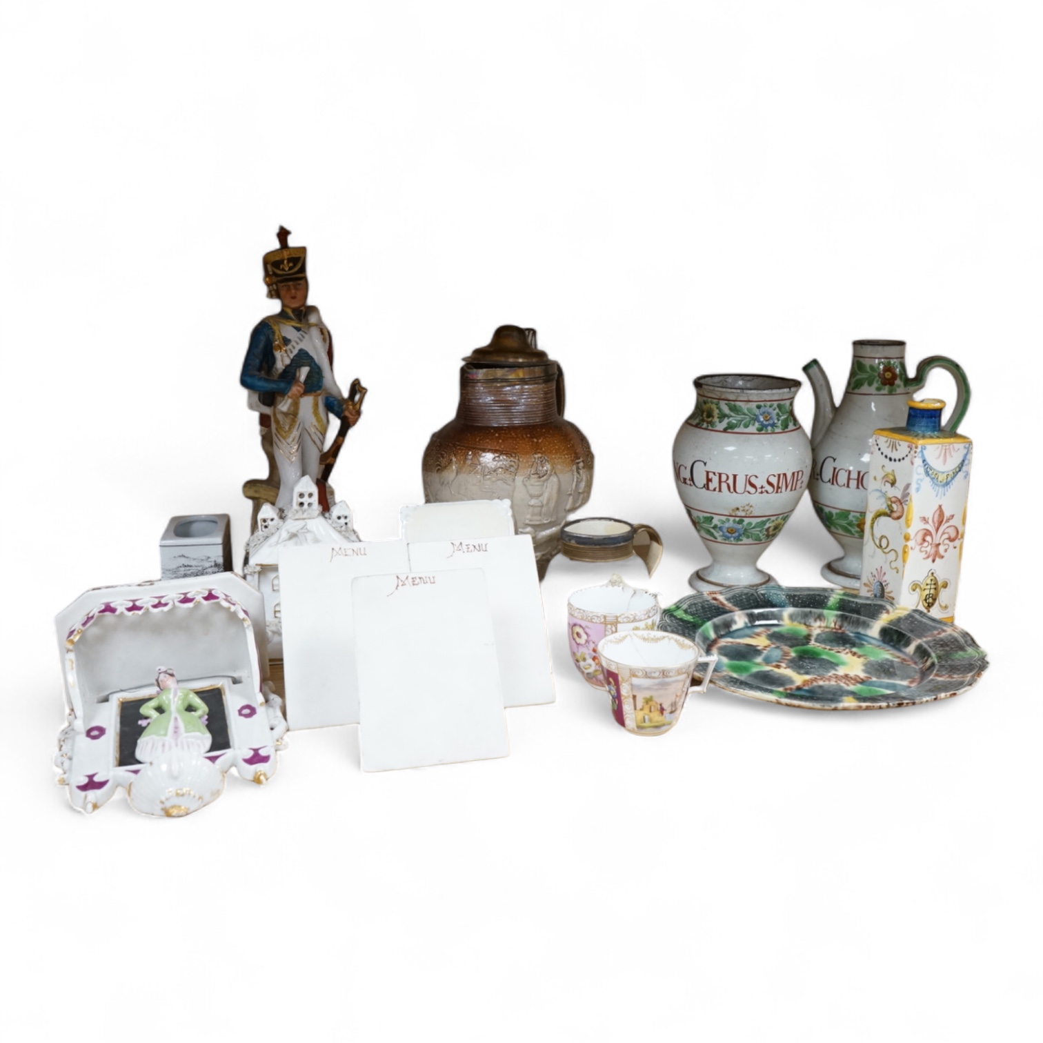 A group of Continental ceramics including two late 18th/early 19th century Italian maiolica wet drug jars, a Staffordshire Whieldon type tortoiseshell glazed plate c.1770 and a silver mounted Mortlake stoneware jug, 24cm